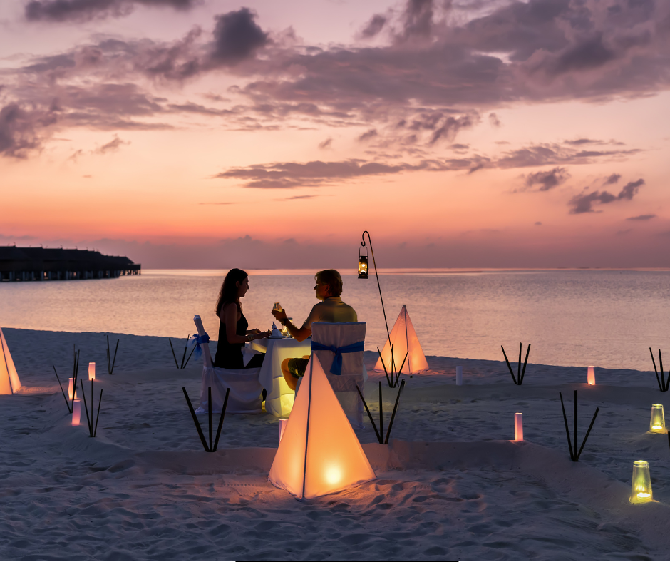 Luxury Travel Now & Where It’s Headed - DVC Advantages Couple at sunset on a custom luxury beach dinner.
