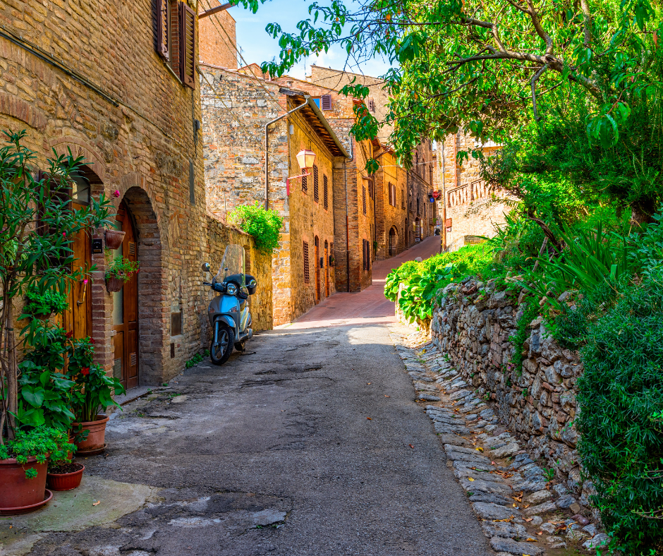 Explore Epic Land Tours: Disney, Luxury & Custom Adventures - DVC Advantages Cobblestone street in Italy.