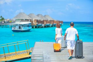 Photo of Couple with Luggage