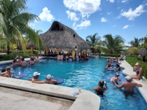 Celebrating at the Swim-Up Pool Bar Mr Sanchos Cozumel - DVC Advantages Guests enjoying drinks and celebrating at the swim-up pool bar at Mr. Sanchoâs Beach Club in Cozumel, Mexico